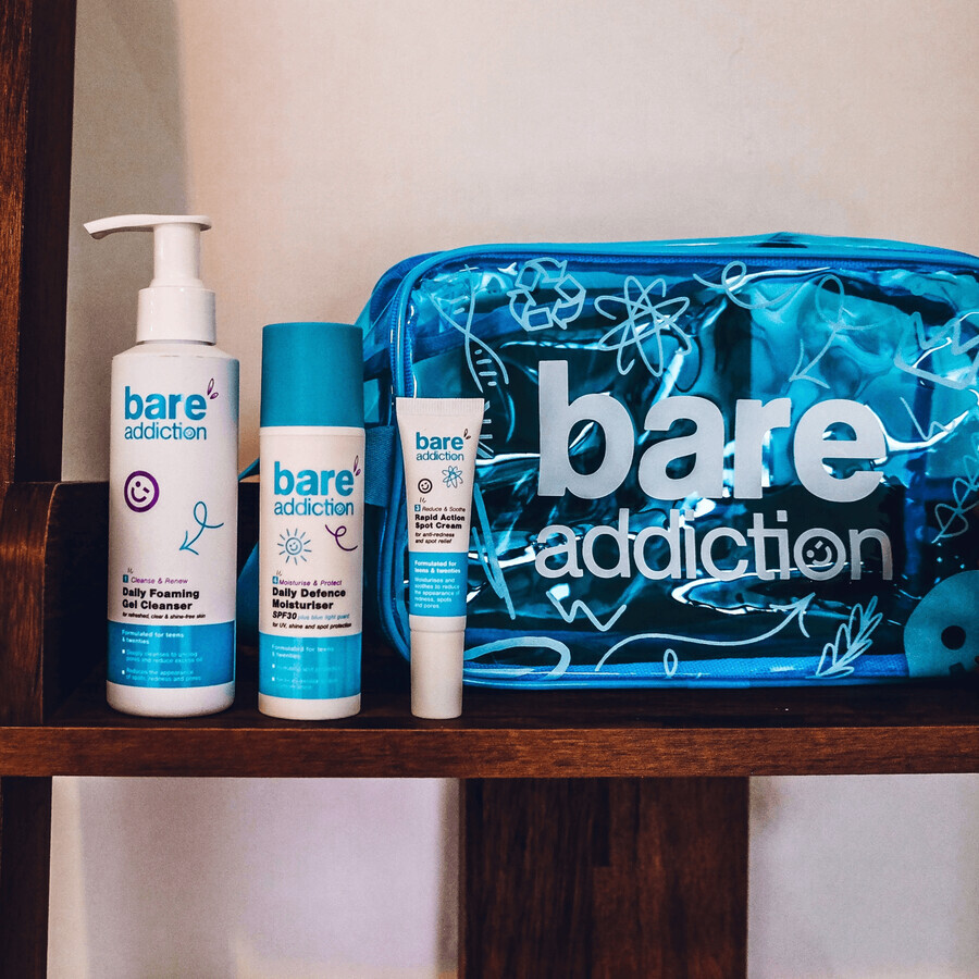 Bare Addiction Necessity Set, a set of products and accessories in a makeup bag